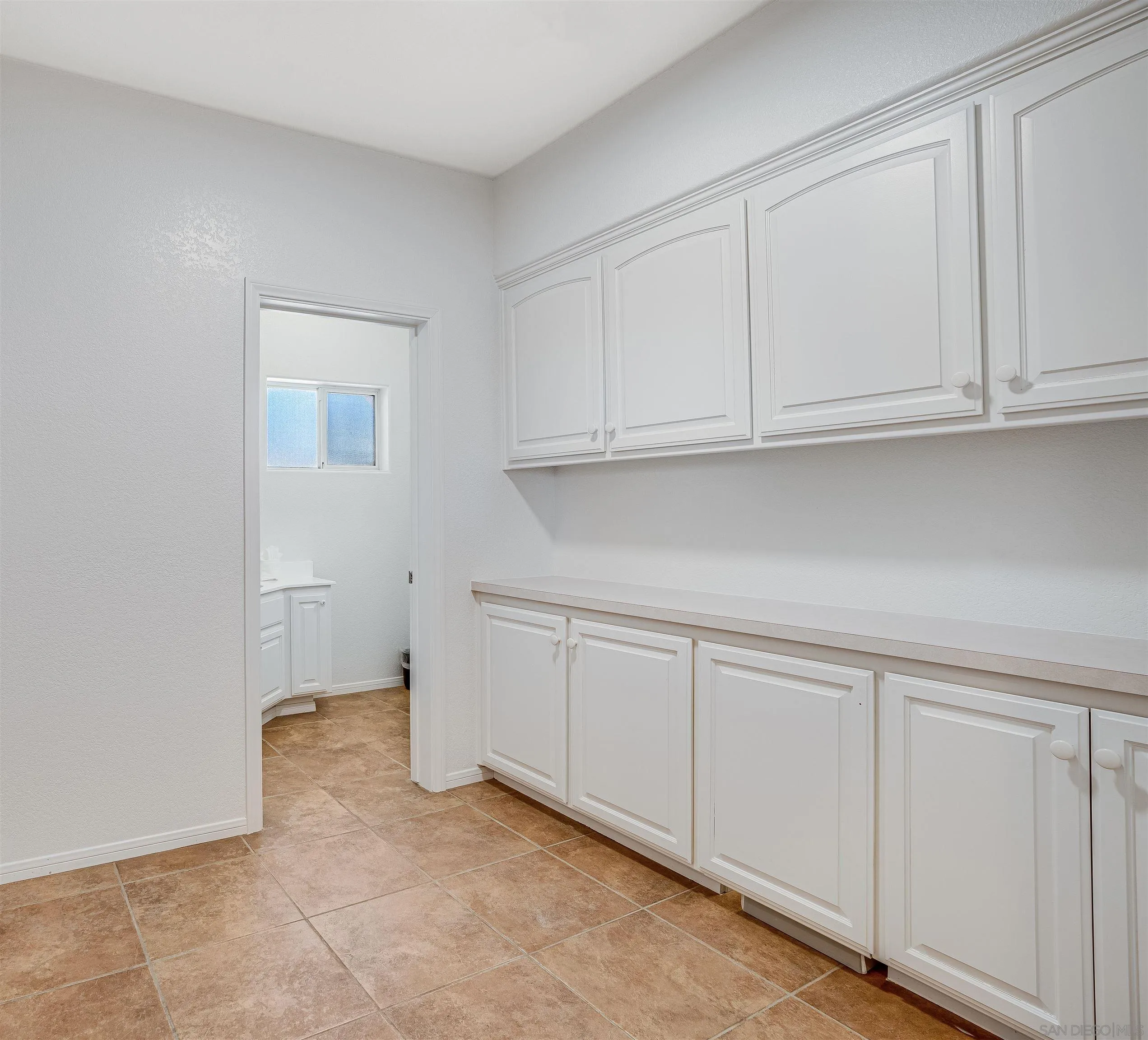 9255 Del Monte Avenue Yucca Valley, CA 92284 - Photo 14 of 46 a view white cabinets