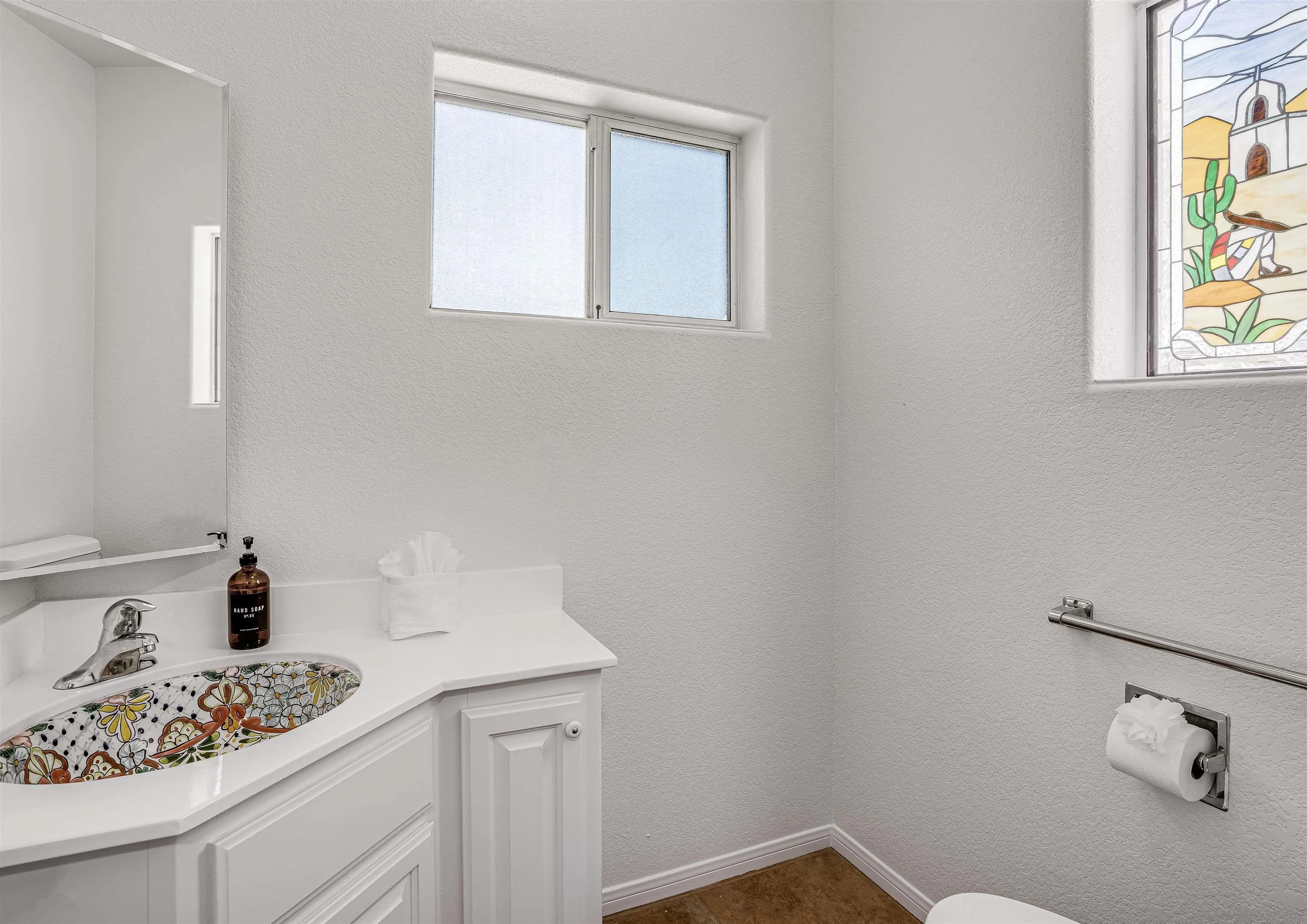9255 Del Monte Avenue Yucca Valley, CA 92284 - Photo 15 of 46 a bathroom with a sink and vanity