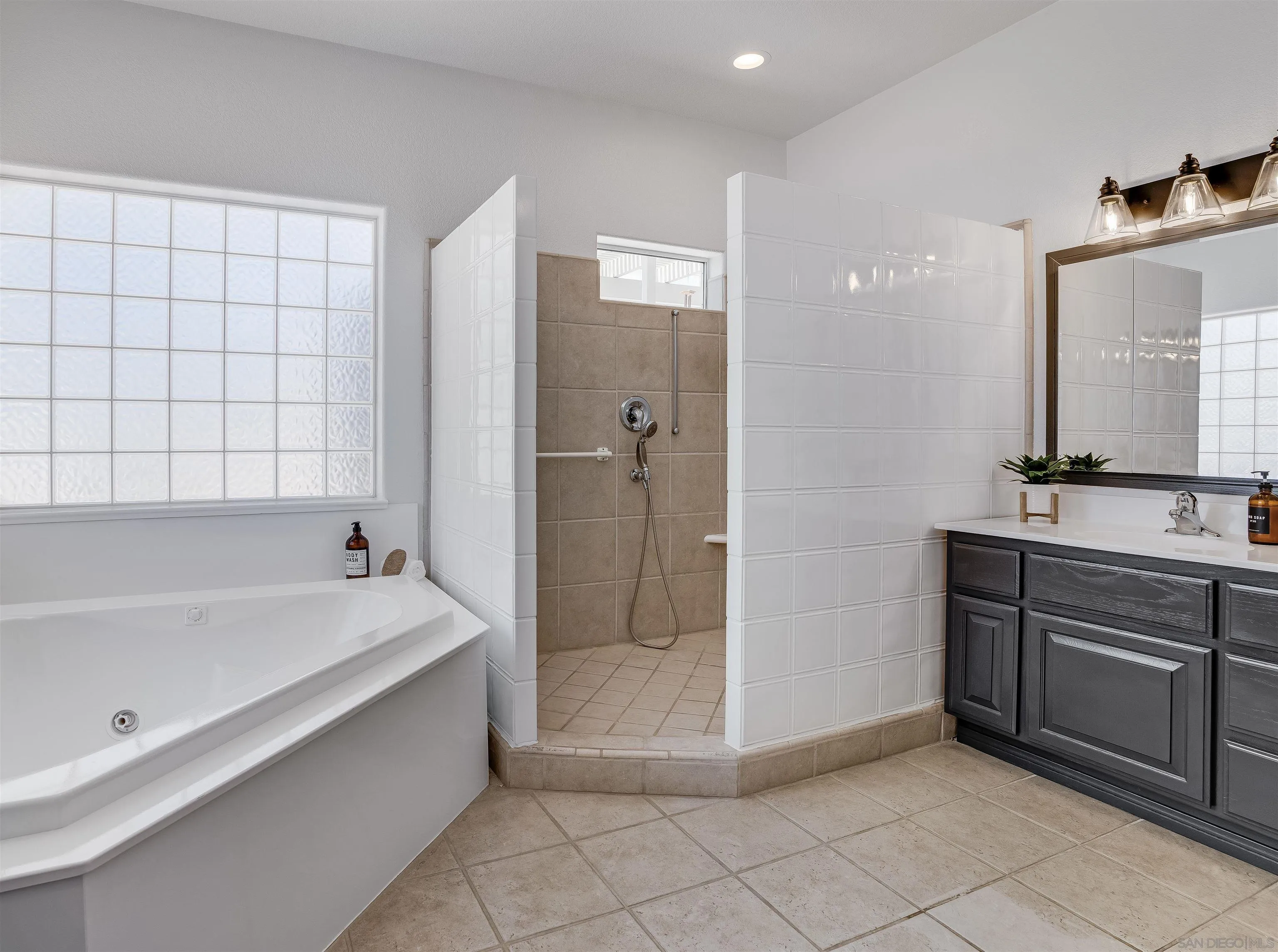 9255 Del Monte Avenue Yucca Valley, CA 92284 - Photo 19 of 46 a bathroom with a bathtub and a sink