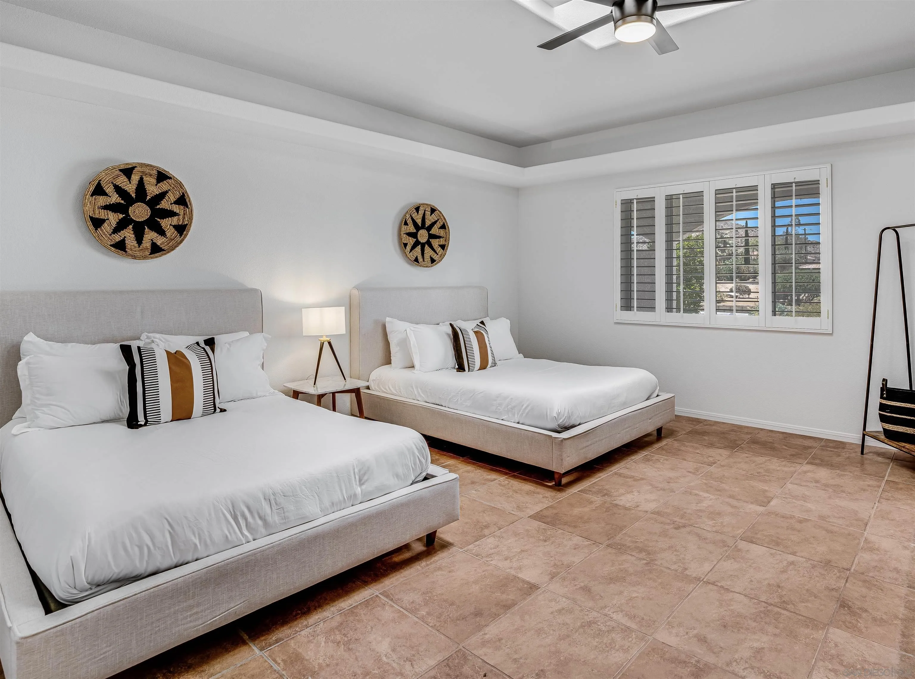 9255 Del Monte Avenue Yucca Valley, CA 92284 - Photo 23 of 46 a bedroom with a bed and a couch