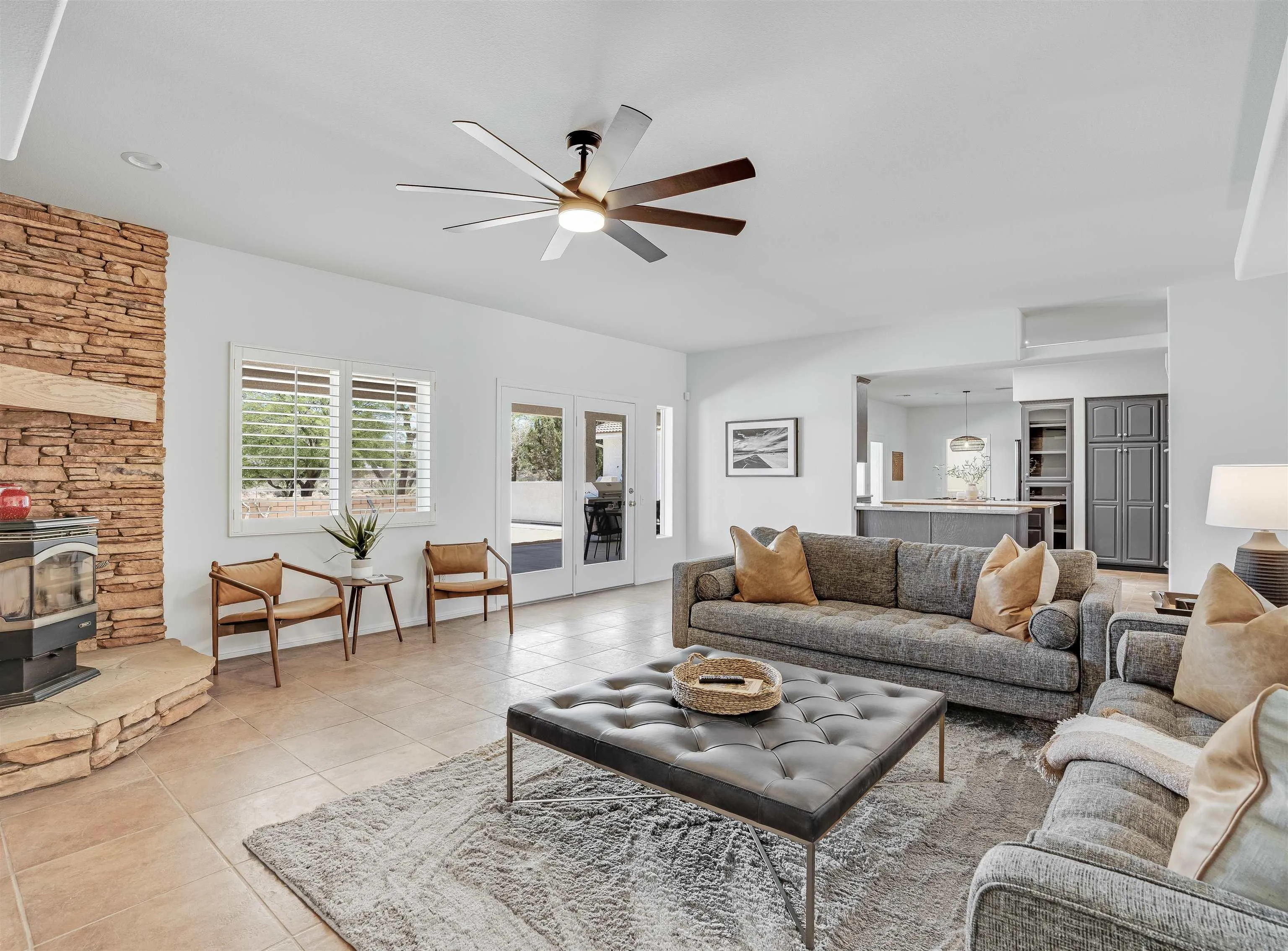 9255 Del Monte Avenue Yucca Valley, CA 92284 - Photo 6 of 46 a living room with furniture and a window