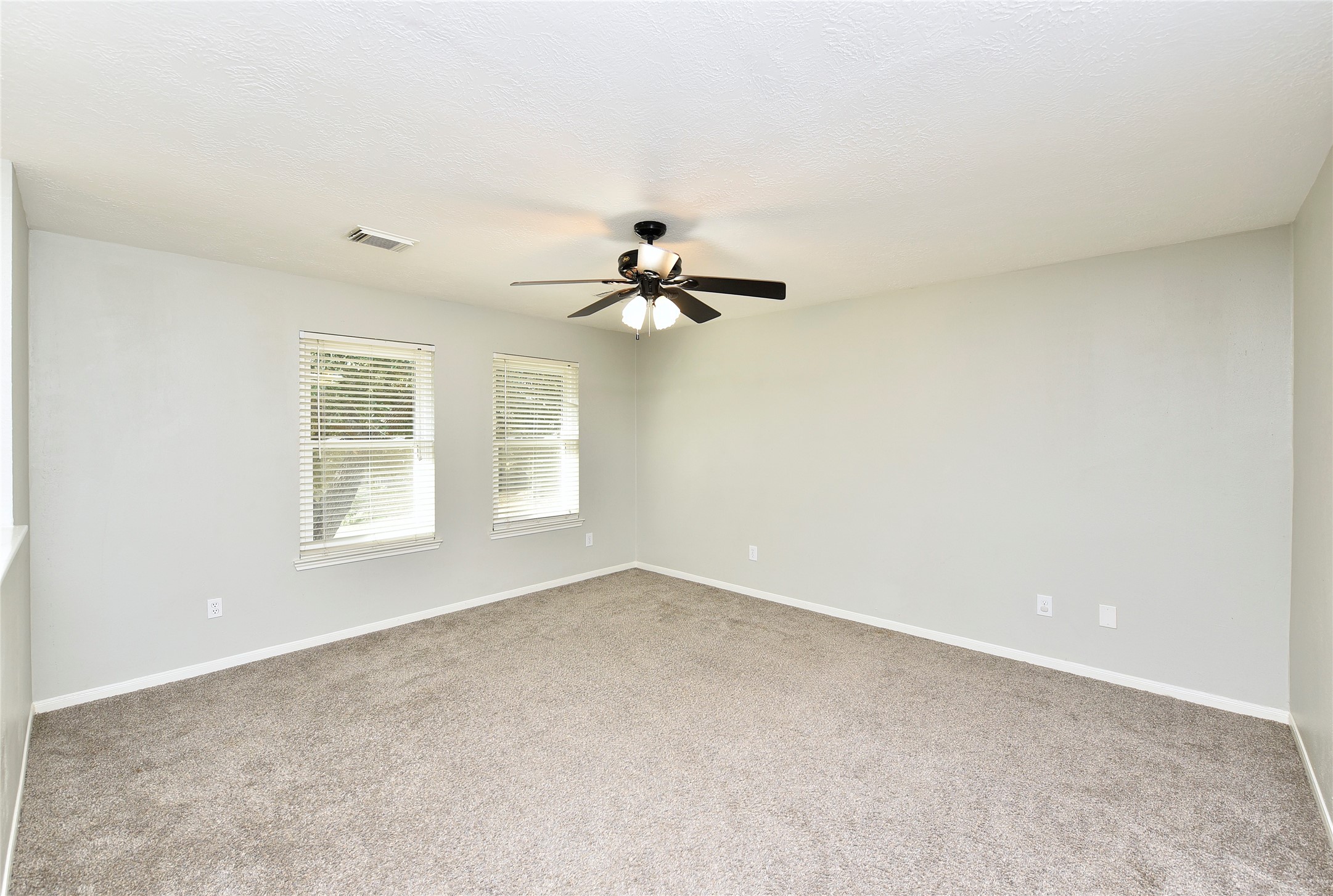 31106 Pine Bay Street Spring, TX 77386 - Photo 18 of 38 The upstairs features a spacious game room, three full bedrooms, and two full bathrooms.