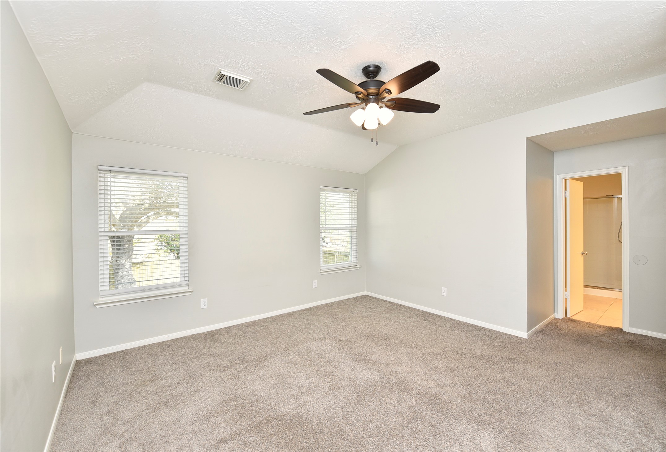 31106 Pine Bay Street Spring, TX 77386 - Photo 21 of 38 The primary suite features a private, en-suite bathroom.