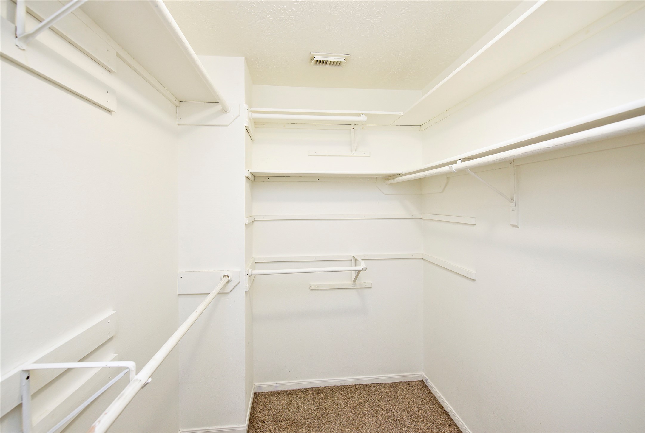 31106 Pine Bay Street Spring, TX 77386 - Photo 25 of 38 The primary suite also features a large walk-in closet.