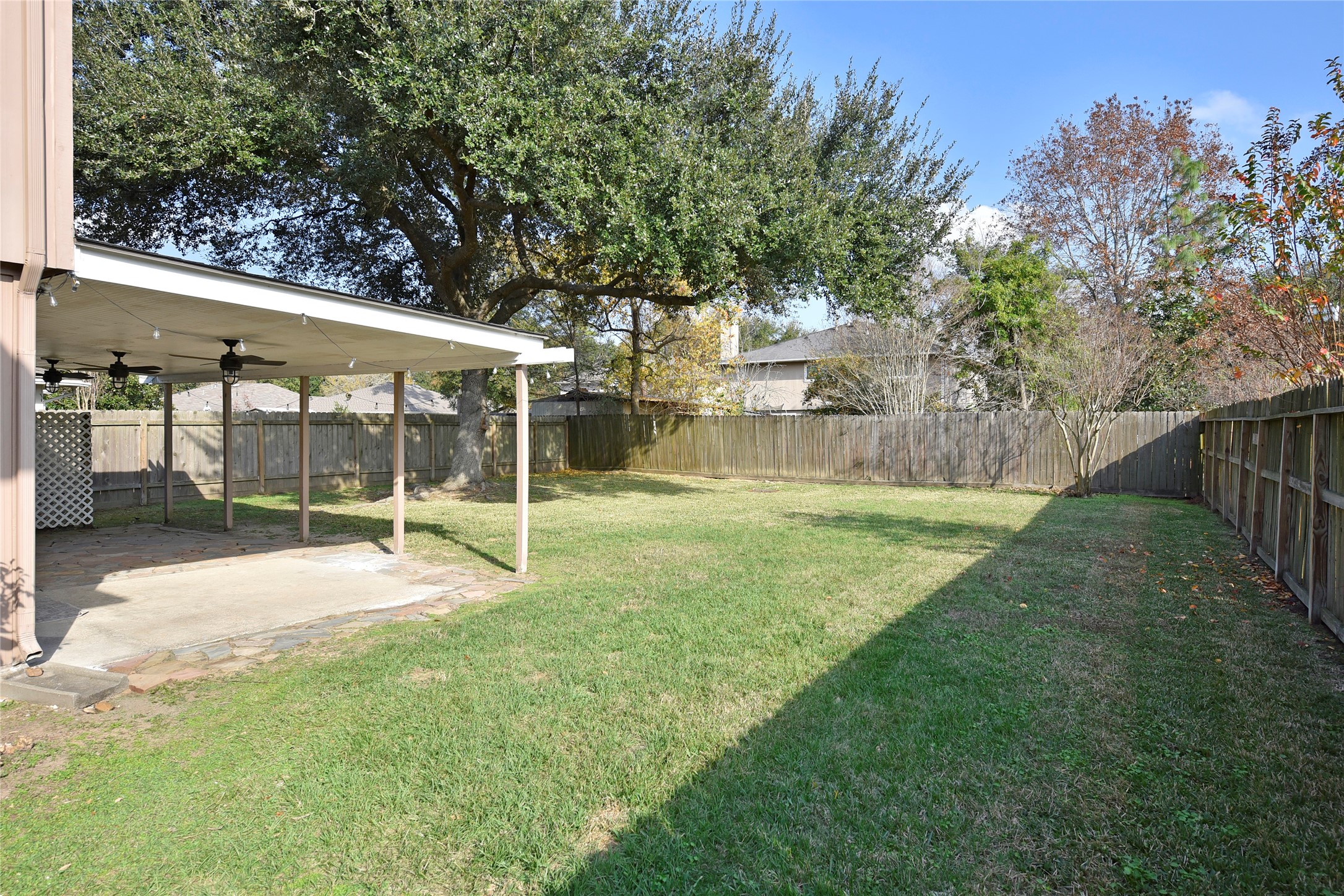 31106 Pine Bay Street Spring, TX 77386 - Photo 33 of 38 a view of a house with backyard and porch
