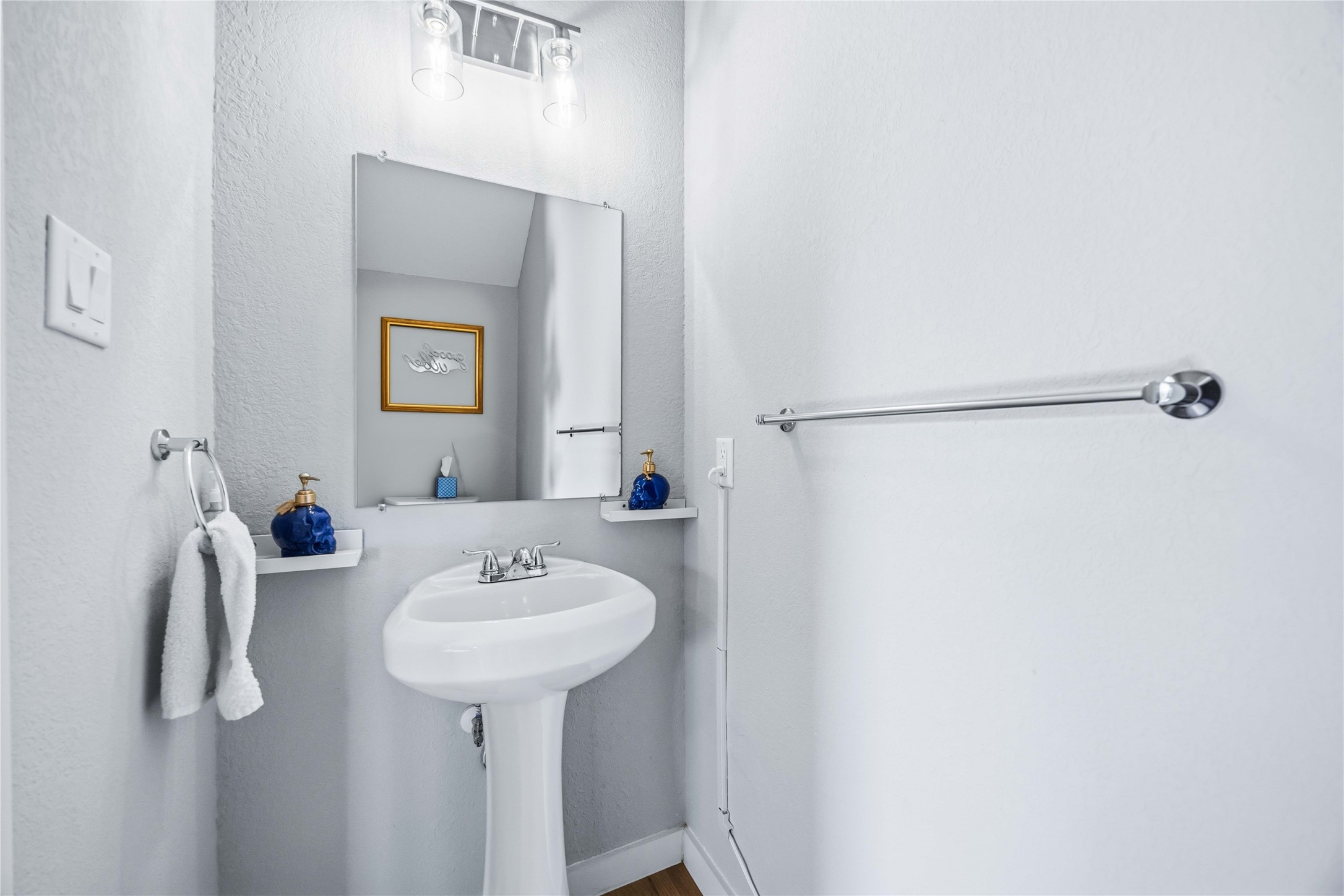 5403 Amy Street Houston, TX 77028 - Photo 13 of 27 a bathroom with a sink and a mirror