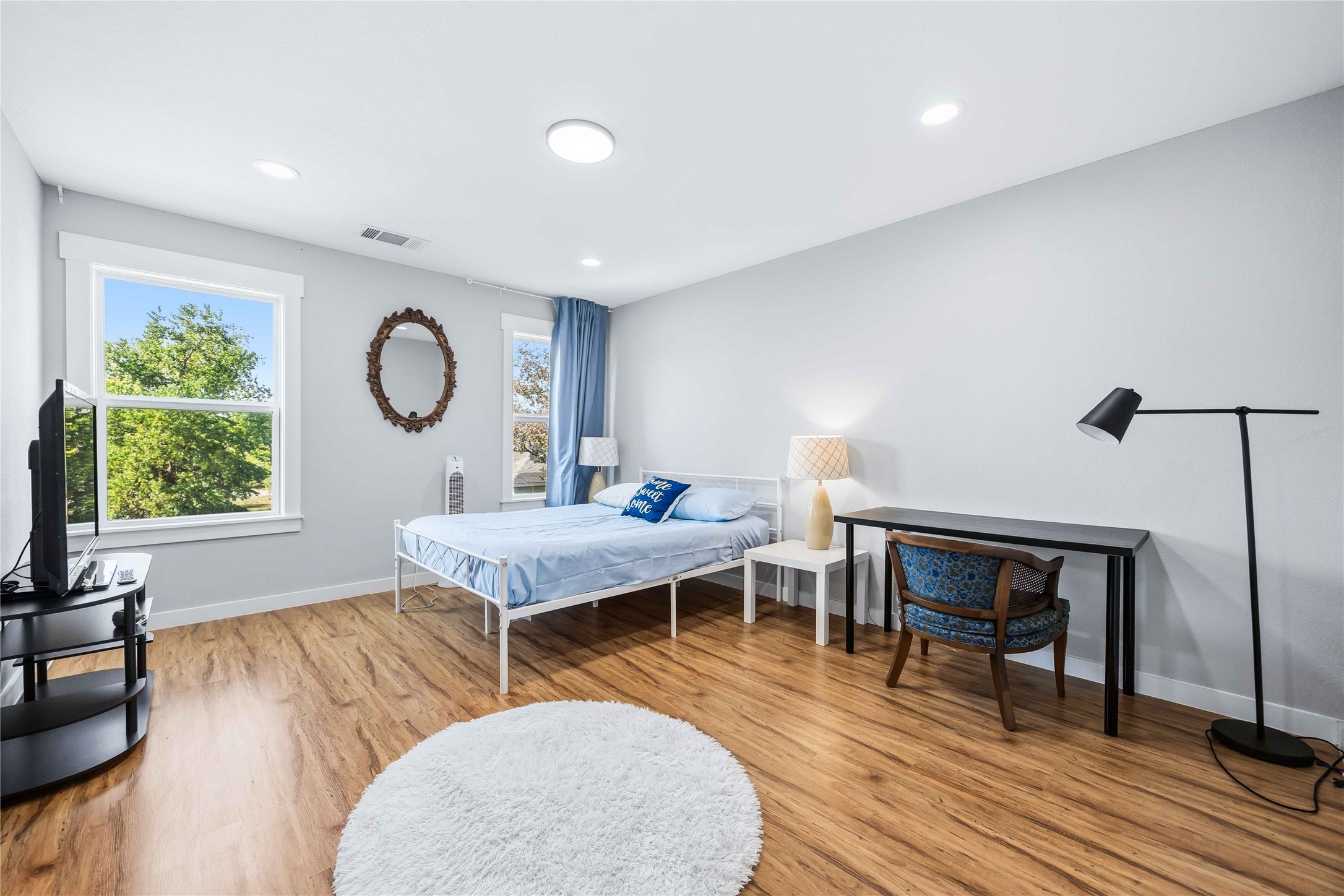 5403 Amy Street Houston, TX 77028 - Photo 16 of 27 a living room with a couch a rug and a window
