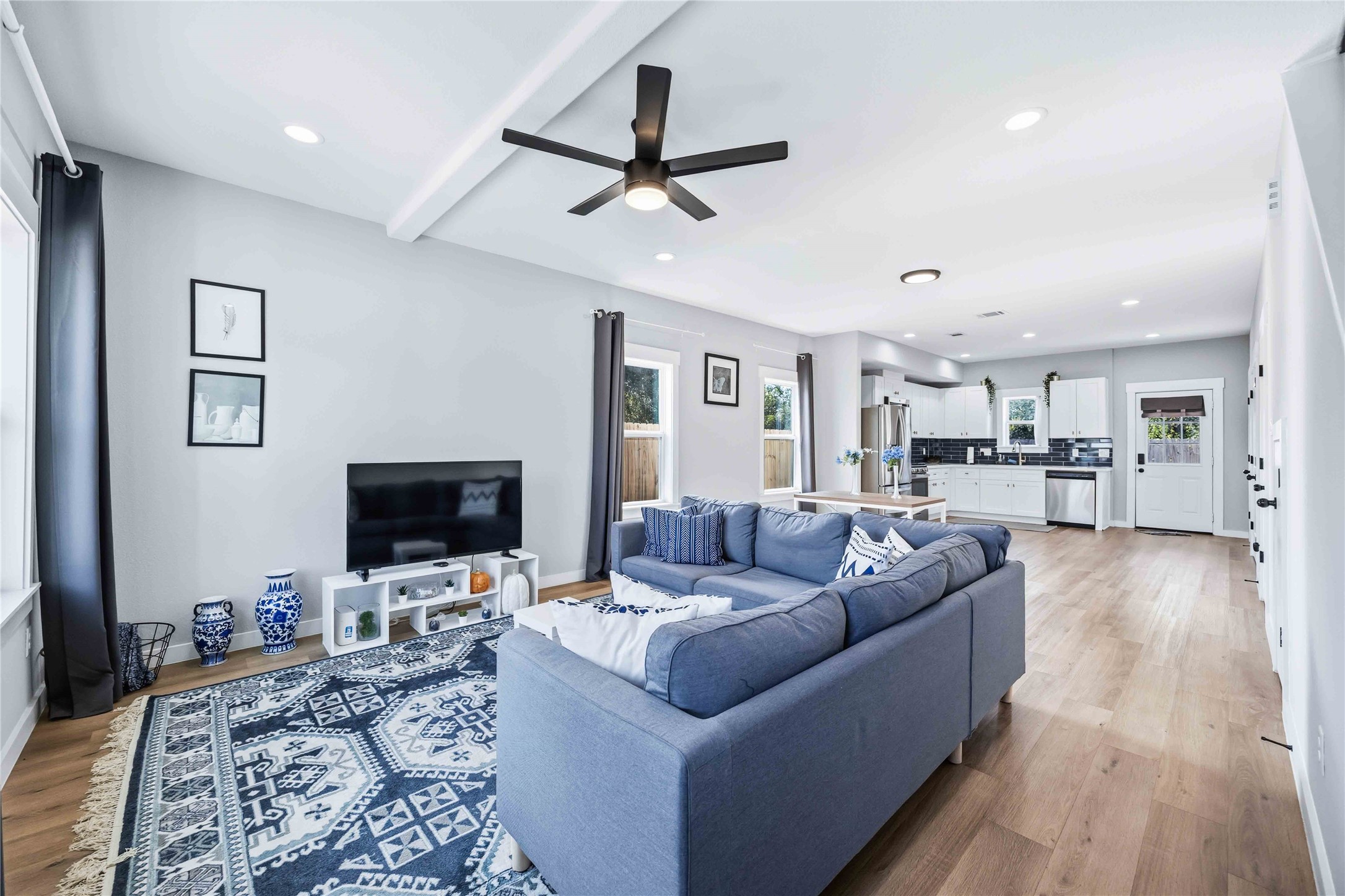 5403 Amy Street Houston, TX 77028 - Photo 5 of 27 a living room with furniture and a flat screen tv