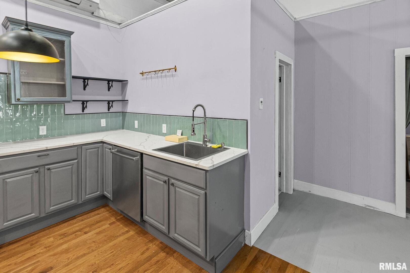 6 South Division Street Du Quoin, IL 62832 - Photo 19 of 47 a kitchen with a sink and cabinets