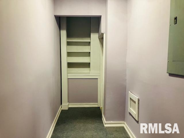 6 South Division Street Du Quoin, IL 62832 - Photo 23 of 47 a view of walk in closet with empty racks
