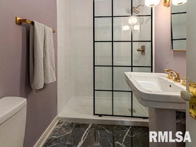6 South Division Street Du Quoin, IL 62832 - Photo 24 of 47 a bathroom with a sink and a mirror