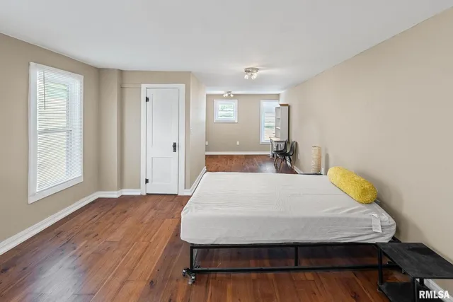 a bathroom with a shower and a sink