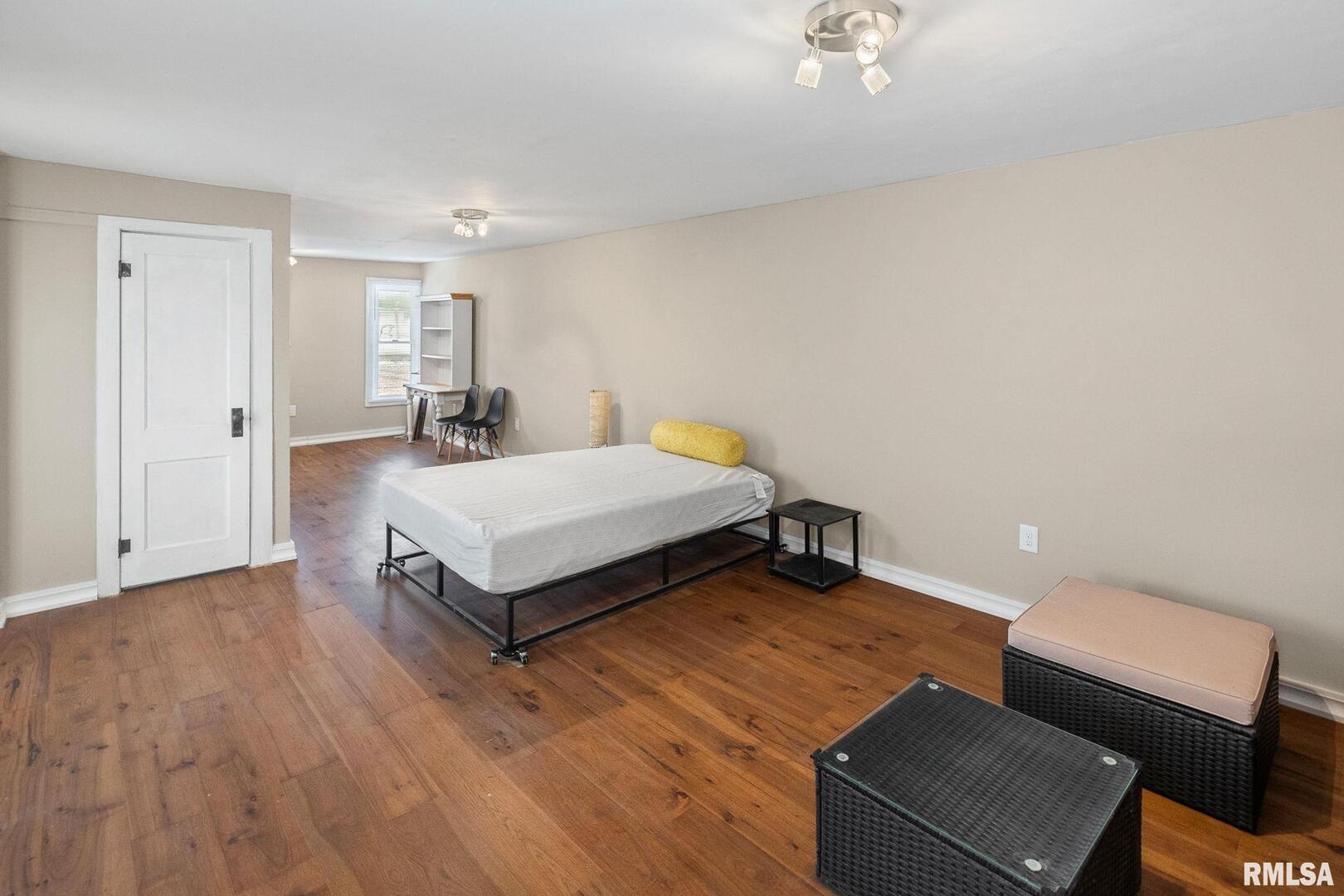 6 South Division Street Du Quoin, IL 62832 - Photo 40 of 47 a bedroom with a bed and a couch