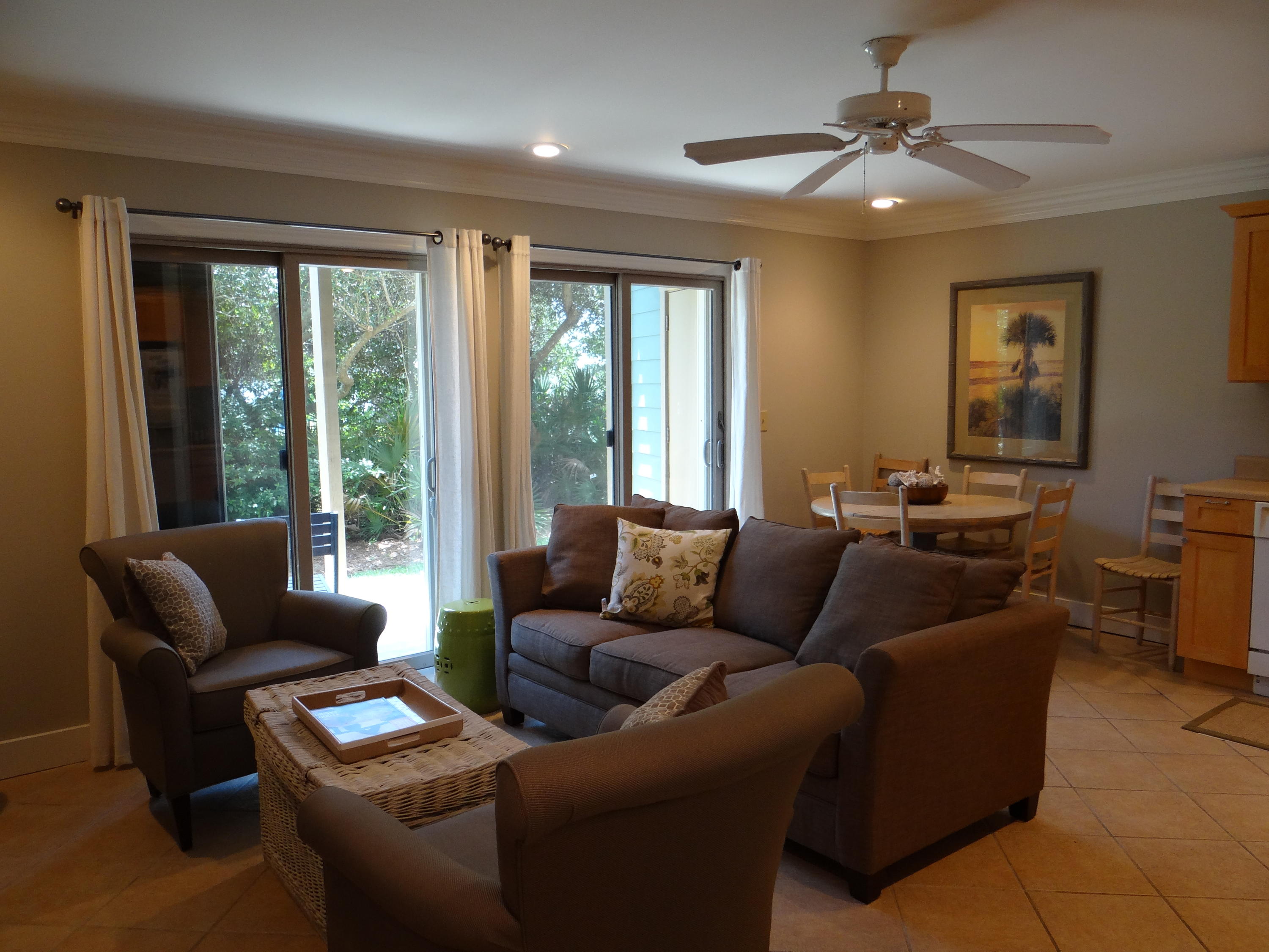 81 South Orange Street, Unit 102 Inlet Beach, FL 32461 - Photo 3 of 14 a living room with furniture and a large window