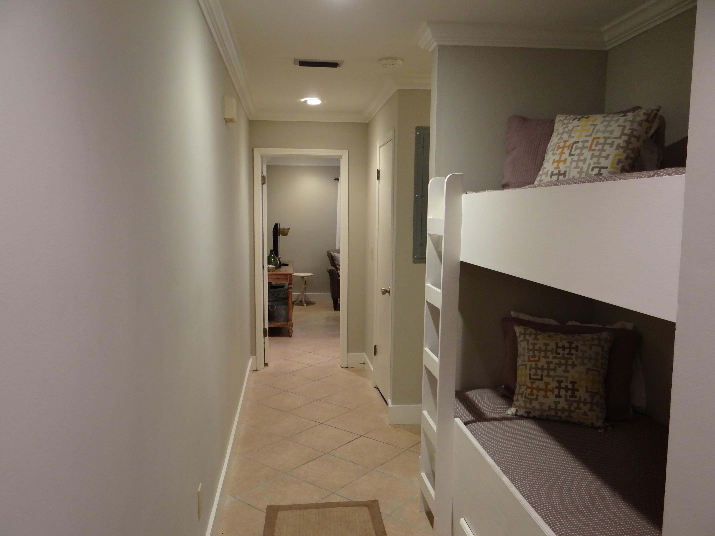 81 South Orange Street, Unit 102 Inlet Beach, FL 32461 - Photo 8 of 14 a hallway with a washer and dryer