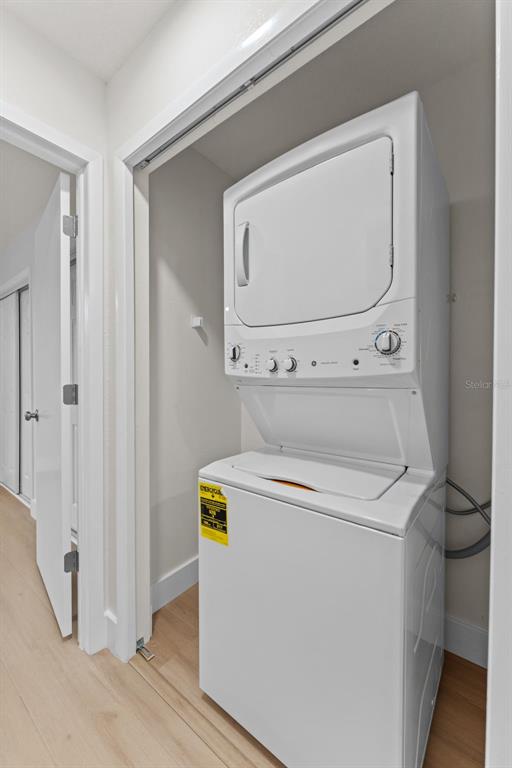 3058 Overlook Place Clearwater, FL 33760 - Photo 30 of 45 a utility room with dryer and washer