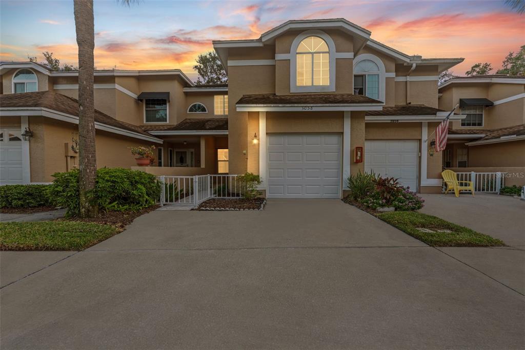 3058 Overlook Place Clearwater, FL 33760 - Photo 45 of 45 a front view of a house with yard