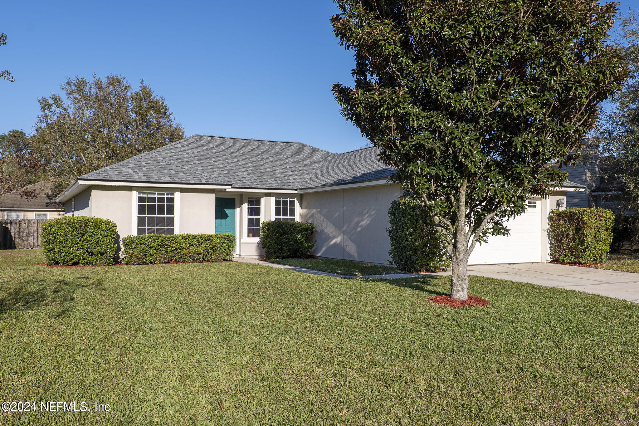 1579 Timber Trace Drive St. Augustine, FL 32092 - Photo 1 of 30 a front view of house with yard and trees
