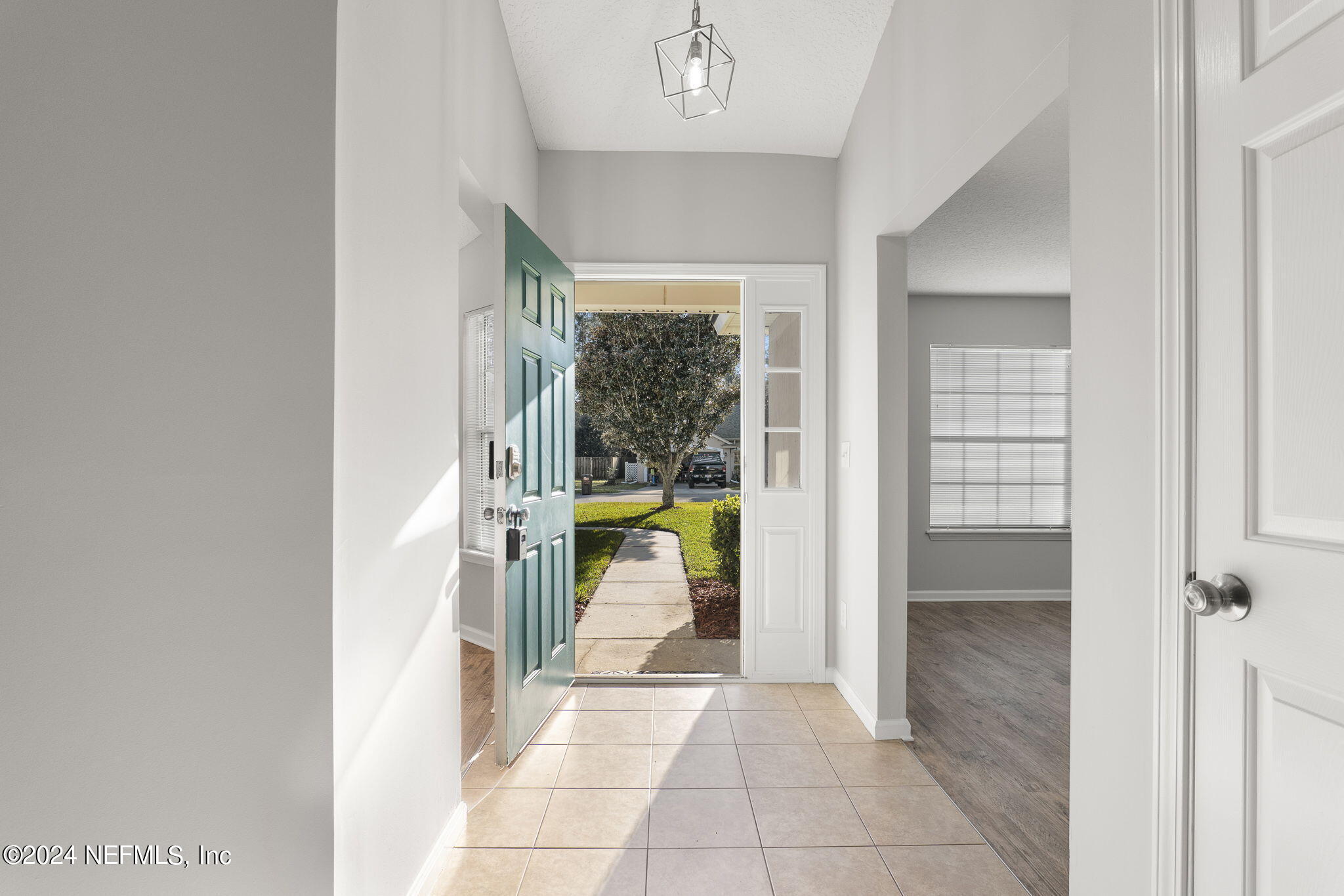 1579 Timber Trace Drive St. Augustine, FL 32092 - Photo 13 of 30 a view of a bathroom with tub and door