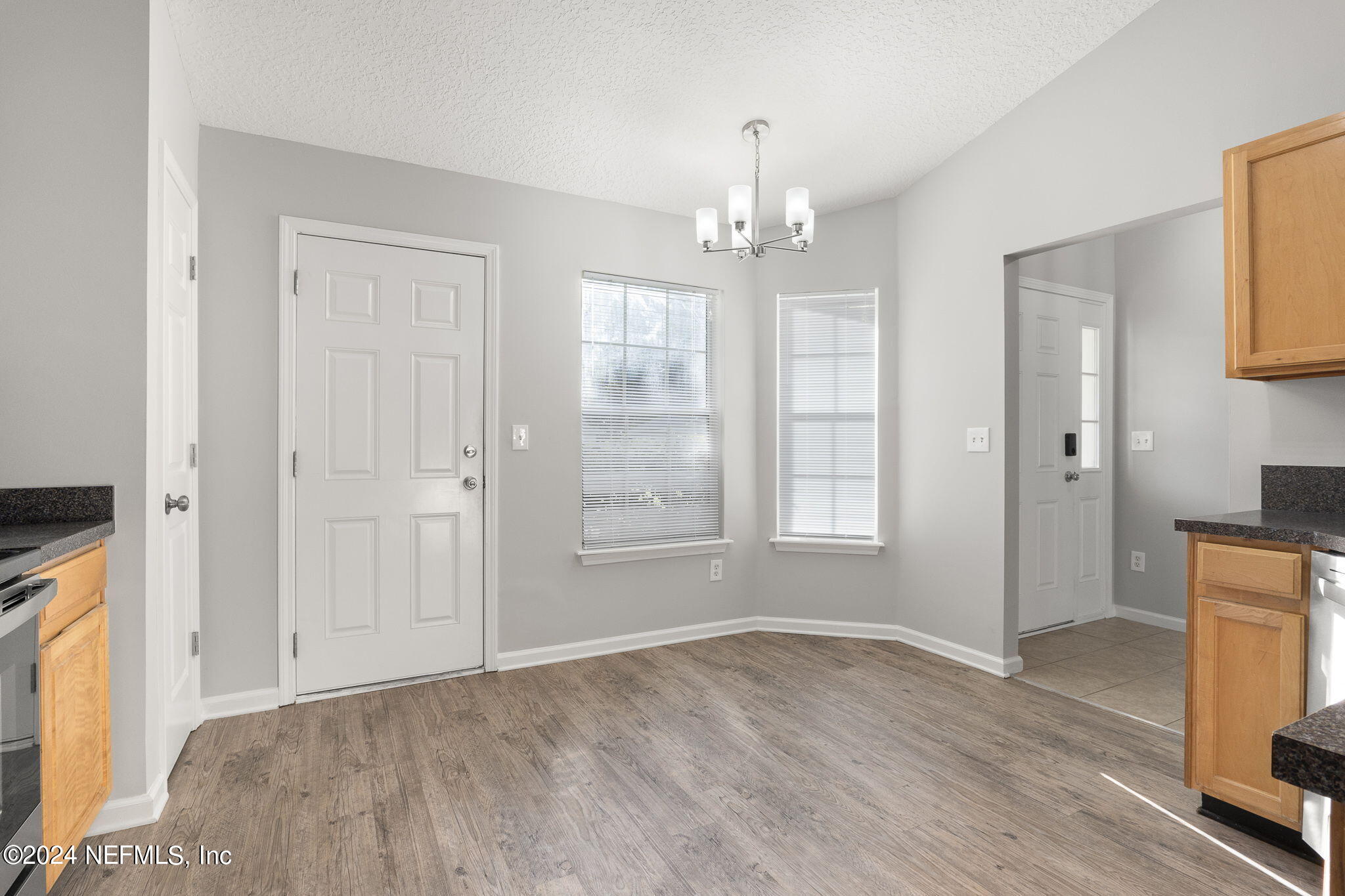 1579 Timber Trace Drive St. Augustine, FL 32092 - Photo 16 of 30 wooden floor in an empty room with a window