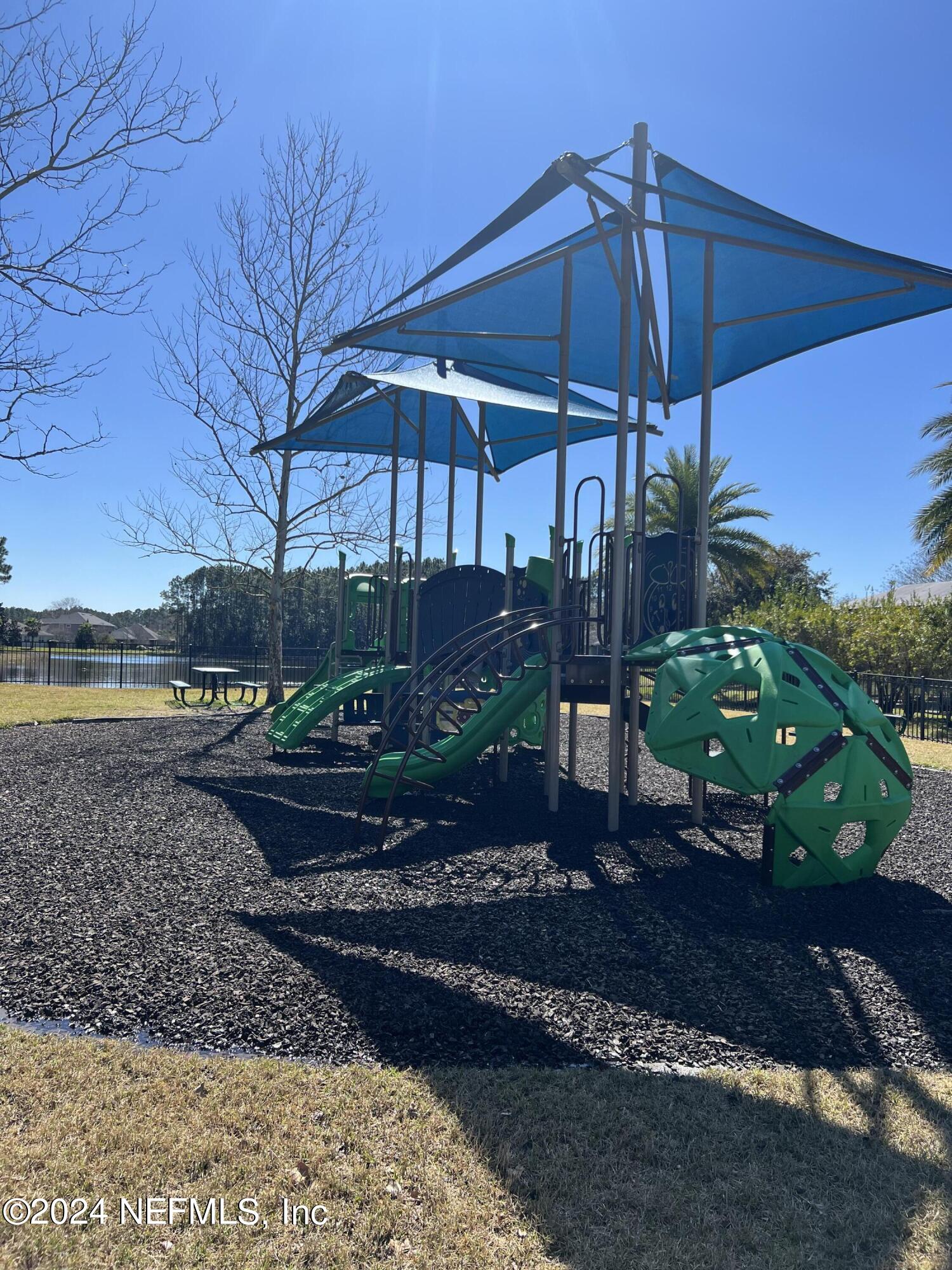 1579 Timber Trace Drive St. Augustine, FL 32092 - Photo 29 of 30 a view of a backyard with wooden floor