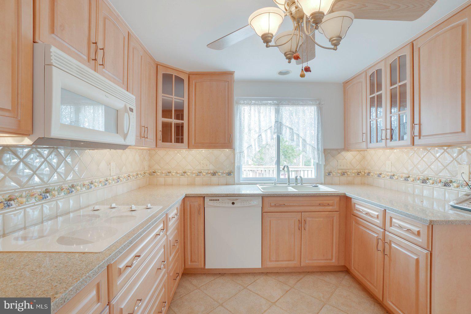 4518 Ambermill Road Nottingham, MD 21236 - Photo 5 of 29 Ceramic Tile Floor And Ceramic Tile Backsplash