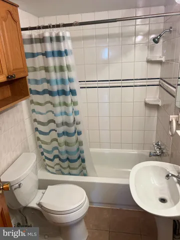 a balcony with wooden floor