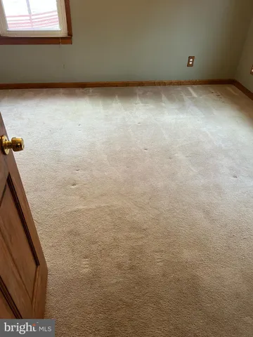 a bathroom with a sink and a window