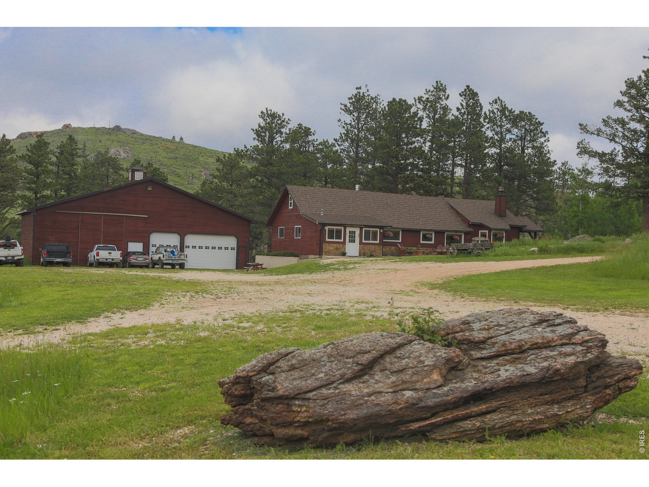 14884 Rist Canyon Road Bellvue, CO 80512 - Photo 21 of 50 a view of a house with a yard