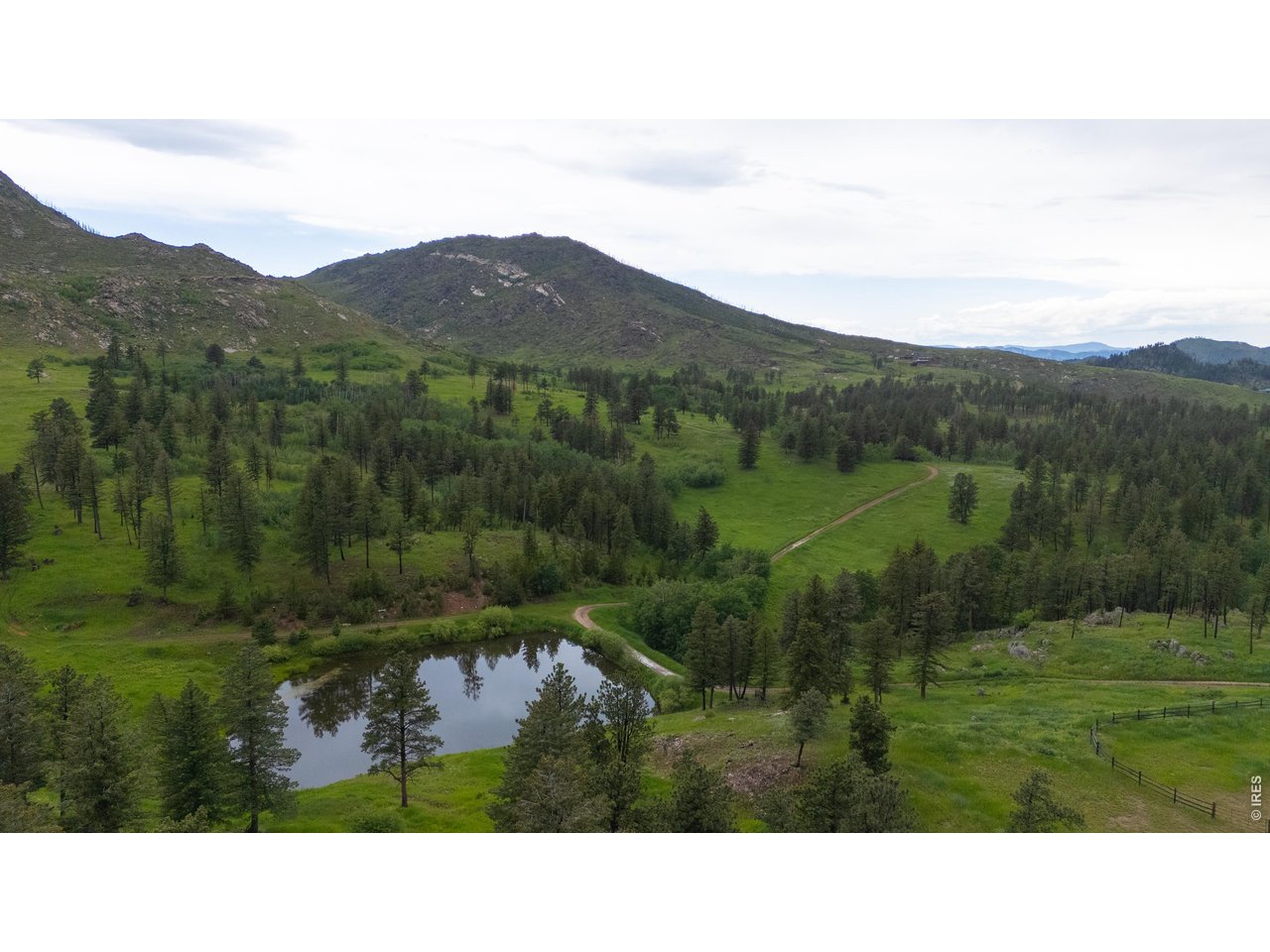 14884 Rist Canyon Road Bellvue, CO 80512 - Photo 3 of 50 a open area with mountains in the background