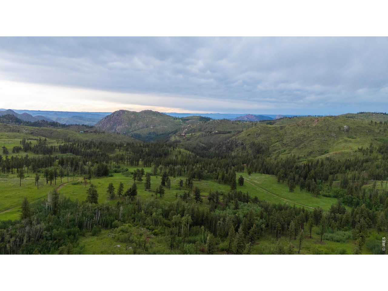 14884 Rist Canyon Road Bellvue, CO 80512 - Photo 42 of 50 a open area with mountains in the background