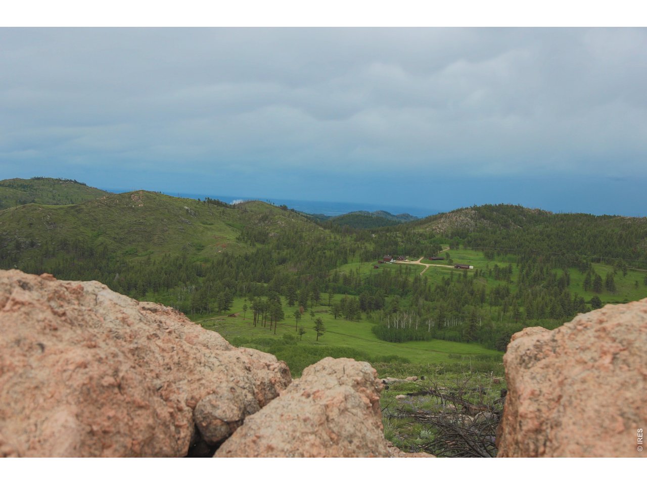 14884 Rist Canyon Road Bellvue, CO 80512 - Photo 50 of 50 a view of a mountain in the distance in a field