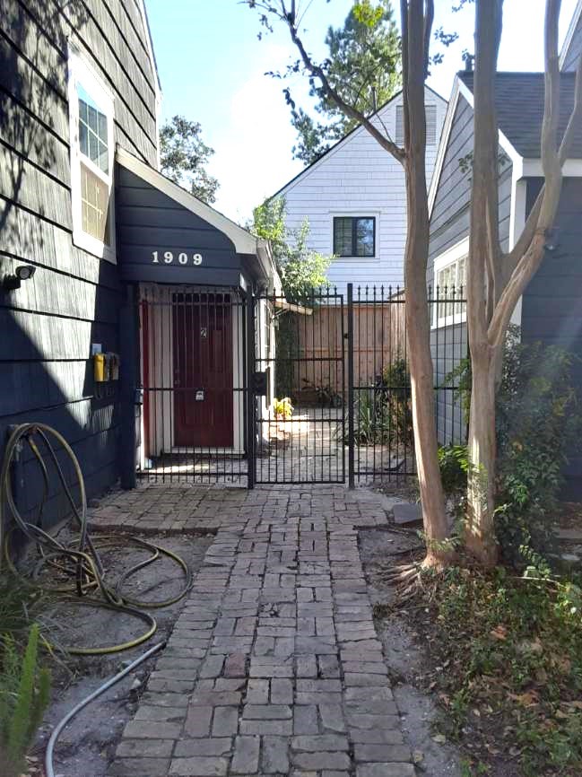 1909 Fairview Street, Unit 2 Houston, TX 77019 - Photo 3 of 10 a view of a house with a patio