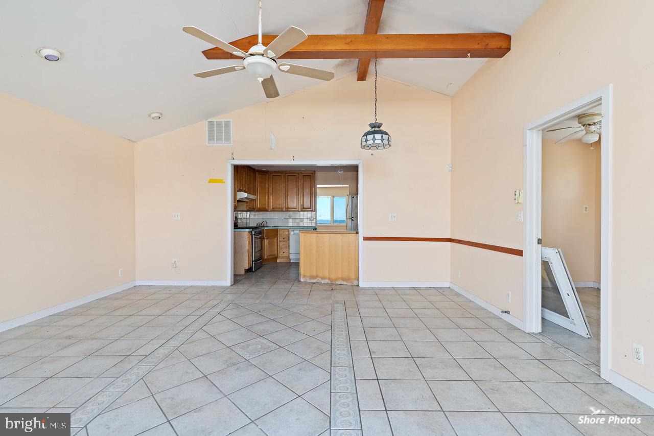10 Iowa Court Tuckerton, NJ 08087 - Photo 24 of 33 a view of a kitchen with a sink and a refrigerator a microwave