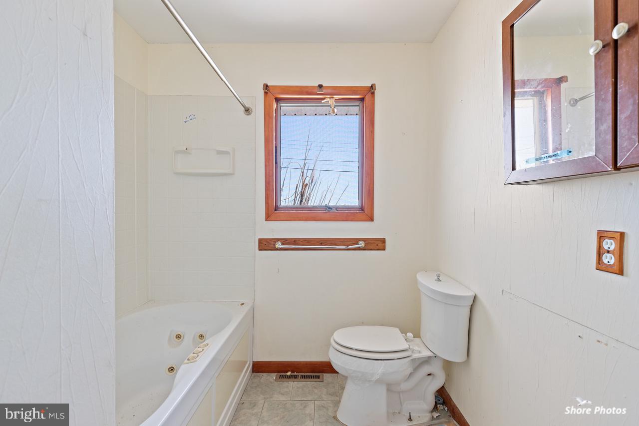 10 Iowa Court Tuckerton, NJ 08087 - Photo 28 of 33 a bathroom with a toilet and a bathtub