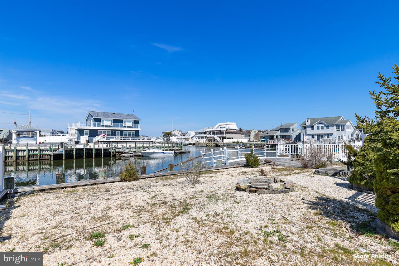 10 Iowa Court Tuckerton, NJ 08087 - Photo 31 of 33 a view of a lake with a building in the background
