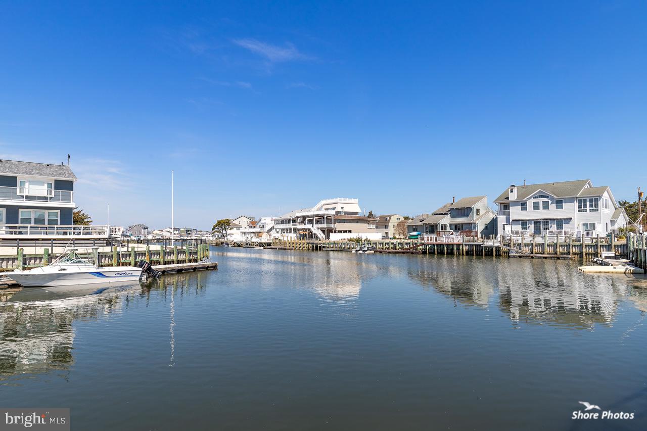 10 Iowa Court Tuckerton, NJ 08087 - Photo 5 of 33 a view of a lake with boats and trees in the background
