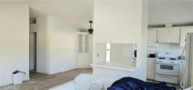 a kitchen with sink cabinets and window