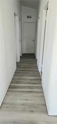 a room with a window and washer dryer