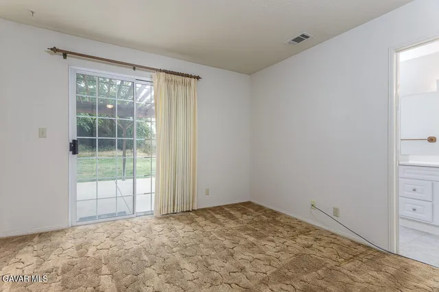 a view of a room with a window