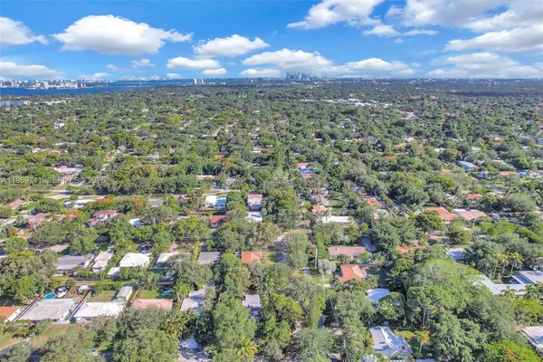 a view of city and green space