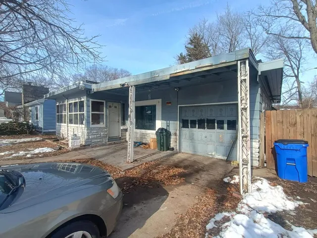 a front view of a house with yard