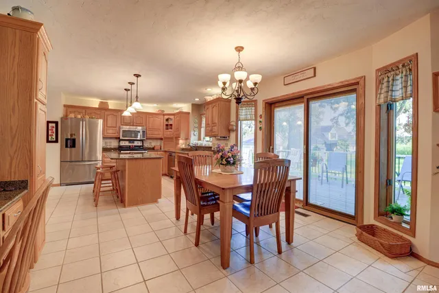 $475,000 | 582 Breezy Point Drive, Clinton, IA 52732