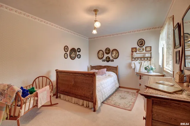 $475,000 | 582 Breezy Point Drive, Clinton, IA 52732