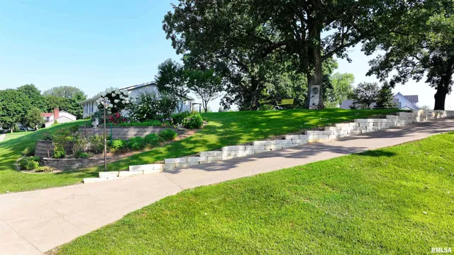 $475,000 | 582 Breezy Point Drive, Clinton, IA 52732