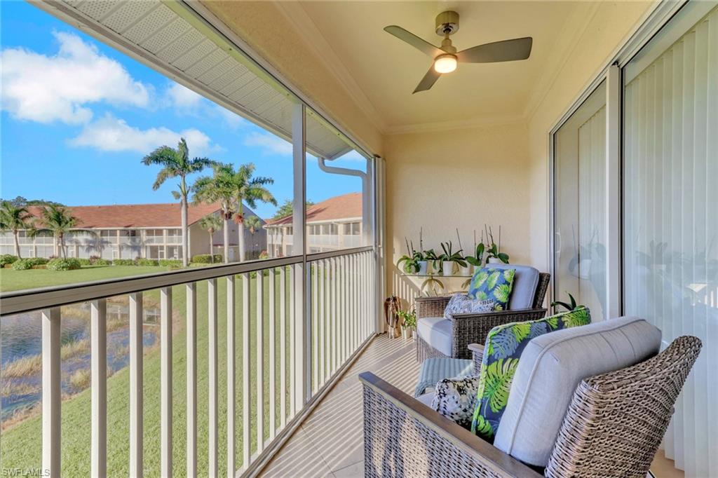 2386 Magnolia Avenue, Unit 7816 Naples, FL 34112 - Photo 17 of 28 a view of a balcony filled with furniture