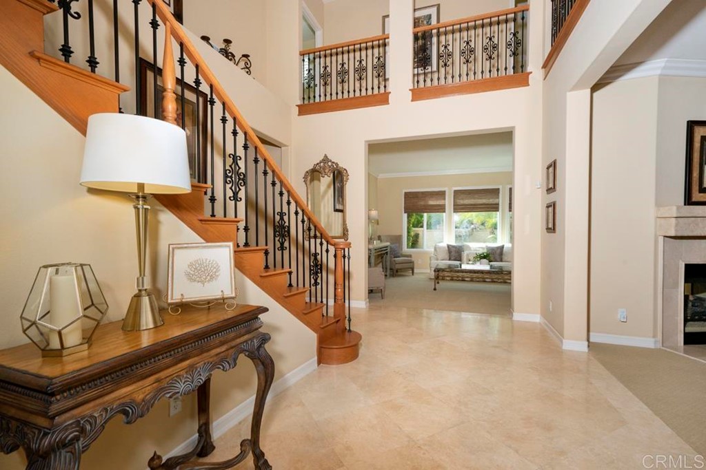 2887 Rancho Cortes Carlsbad, CA 92009 - Photo 16 of 46 a view of entryway and hall with wooden floor