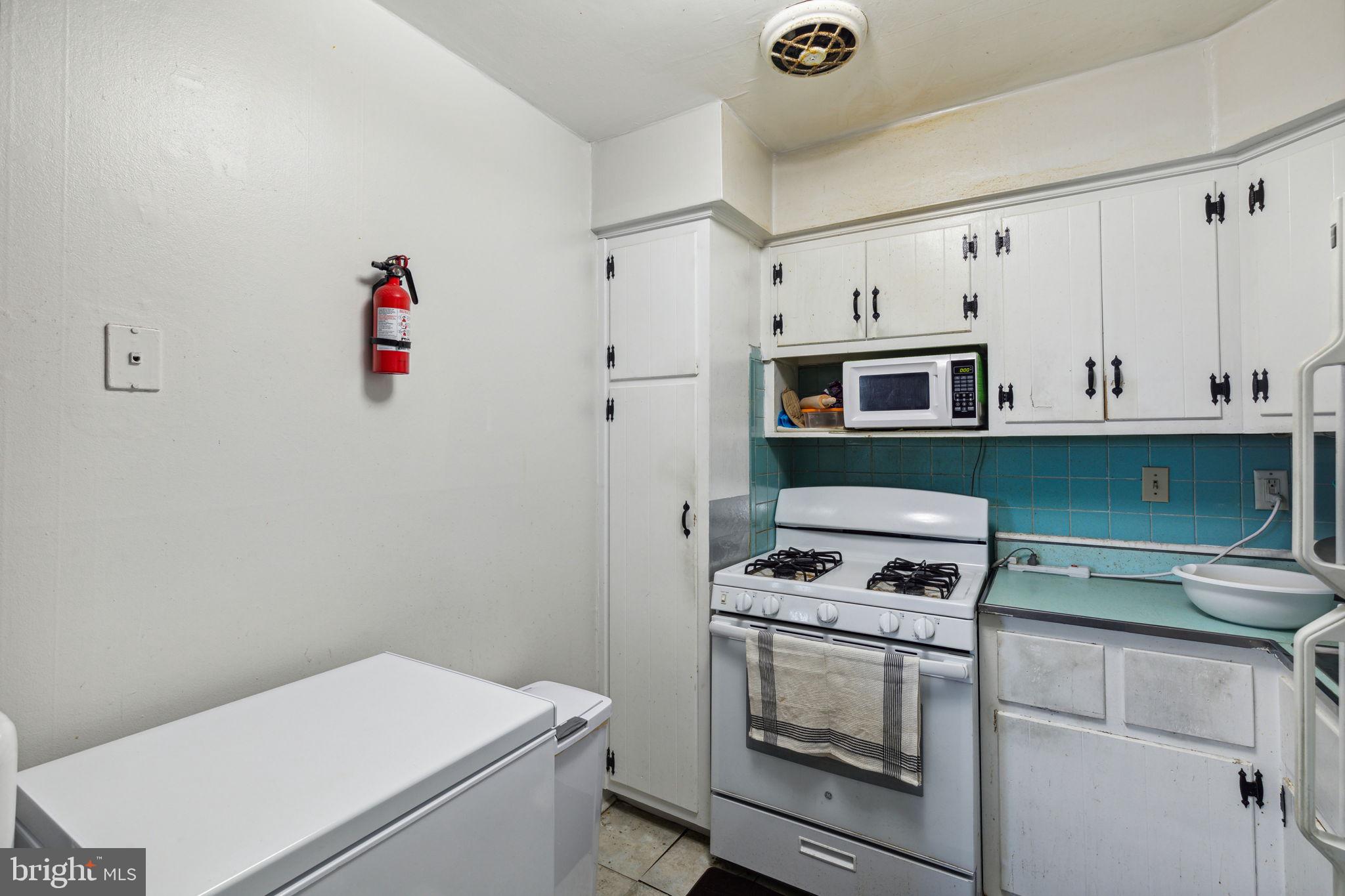 392 Beverly Boulevard Upper Darby, PA 19082 - Photo 11 of 26 a room with storage and utility