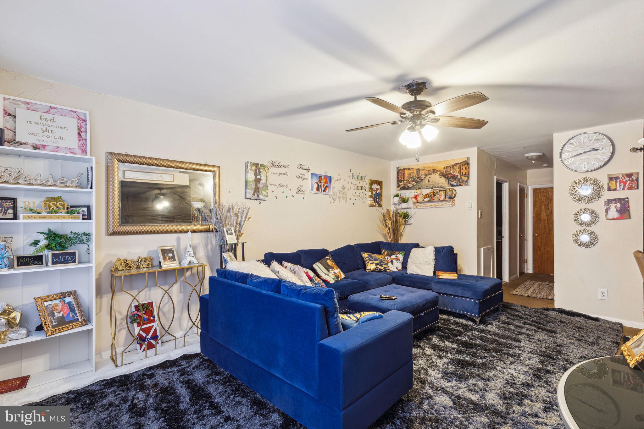 392 Beverly Boulevard Upper Darby, PA 19082 - Photo 15 of 26 a living room with furniture and a flat screen tv