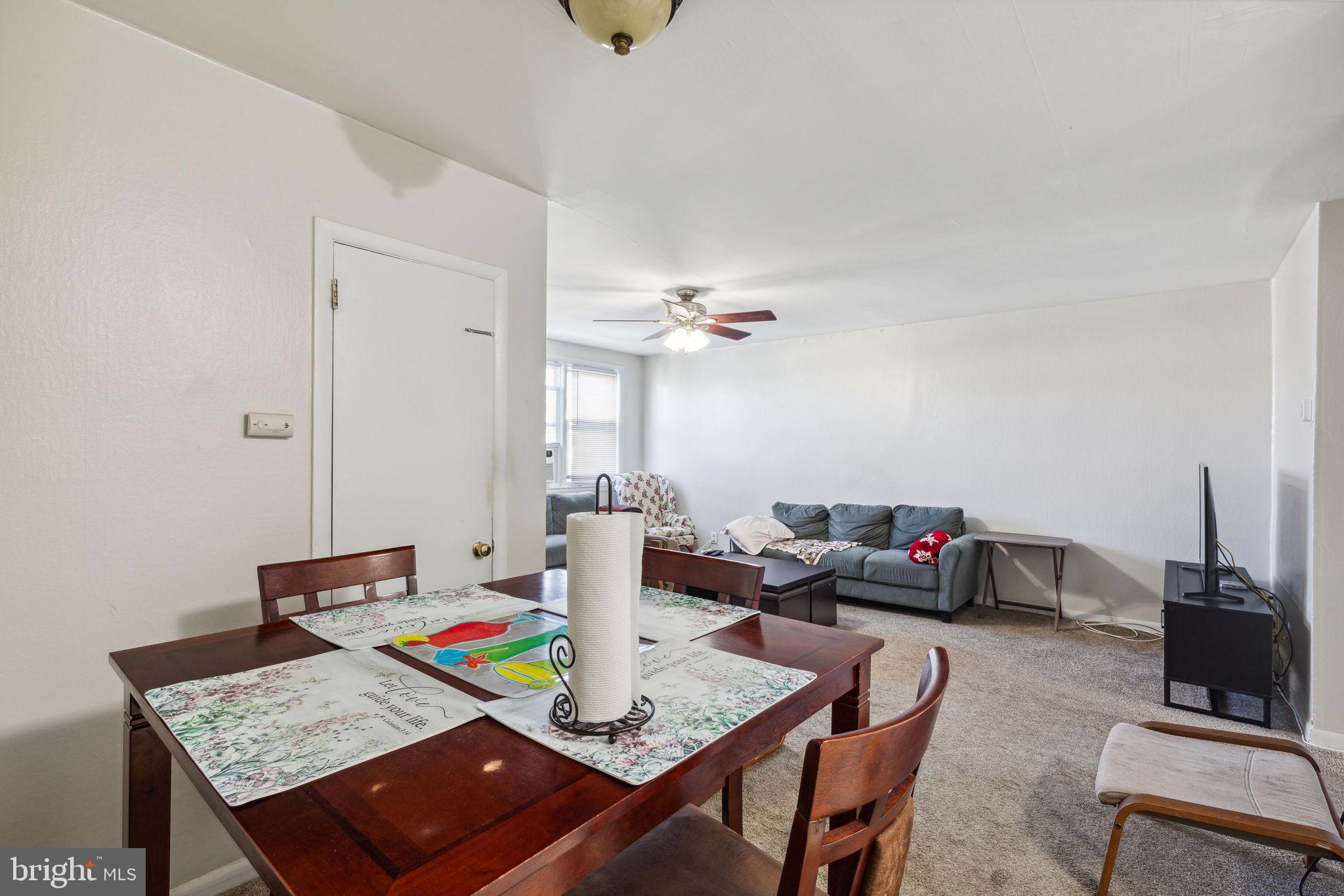 392 Beverly Boulevard Upper Darby, PA 19082 - Photo 8 of 26 a living room with furniture and a rug